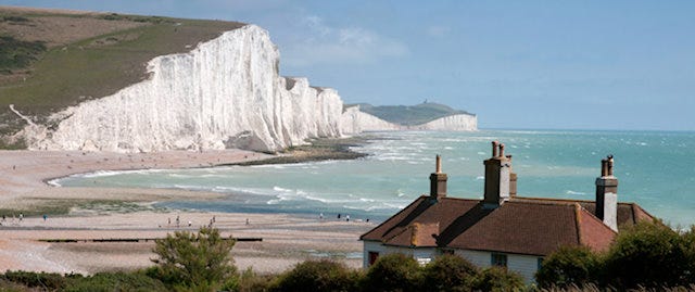 A beautiful bay overlooked by a white cliff