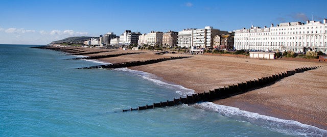 beachside properties with the sand and sea