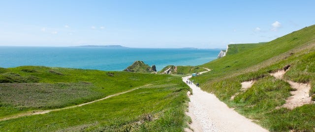 Walkers on a coastal path 