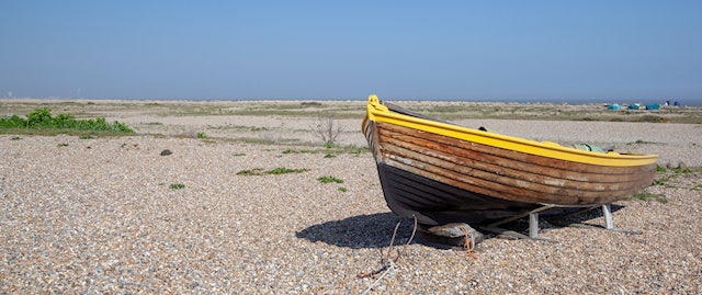 Boat on the shingle shoreline