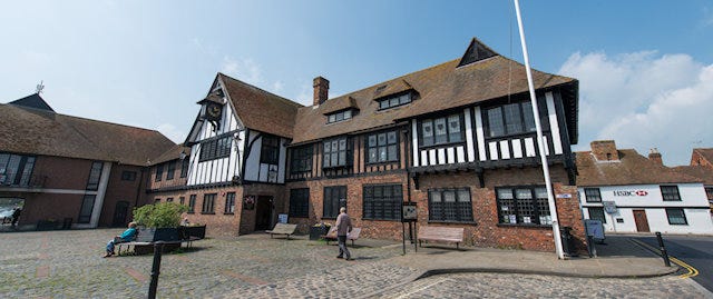 a large, Tudor style building