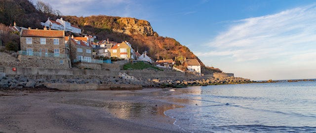 Cottages perched on the hillside overlooking Runswick Bay
