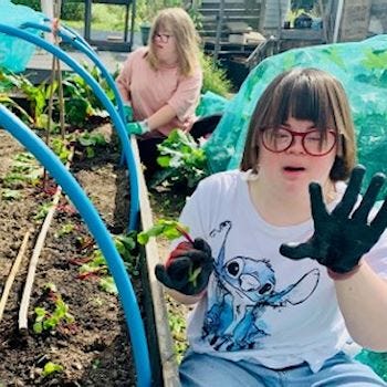 Children working in a community allotment