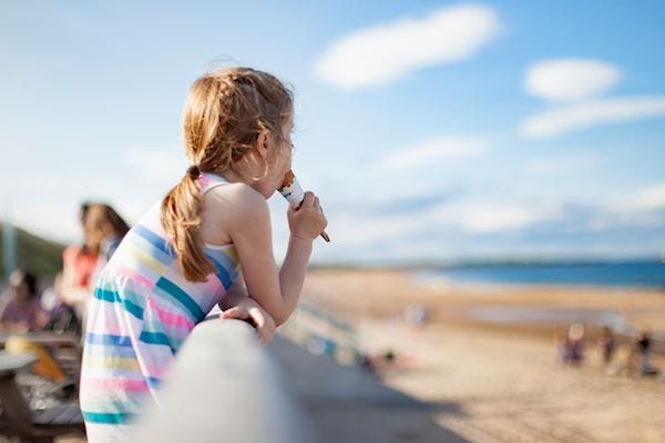 Eating an ice cream at the beach