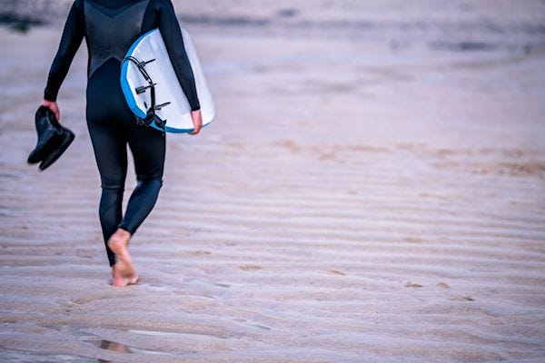 Walking with a surf board