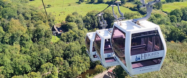 Looking down over cable cars and the landscape