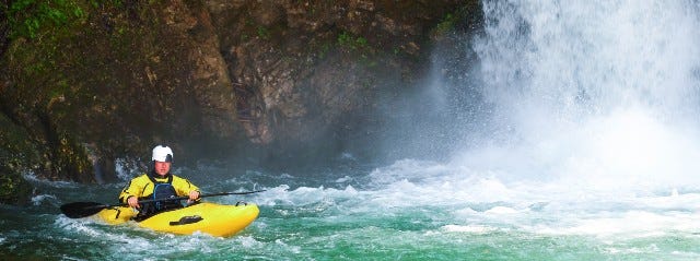 Kayaking under Waterfalls