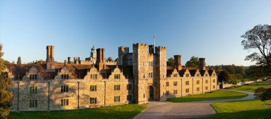 panoramic view of huge stately home in the sun