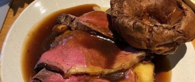 Roast beef with large yorkshire pudding