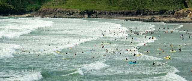 Surfers at Polzeath