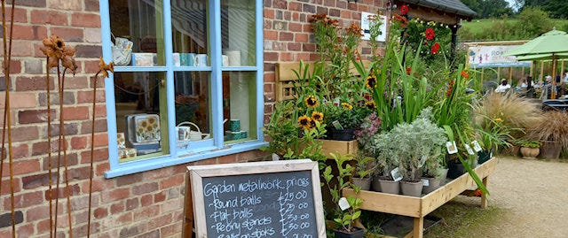 Flower stand and chalboard menu at the Helmsley Walled Garden
