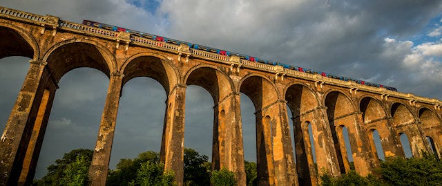 Train passing over the Ouse Valley Viaduct