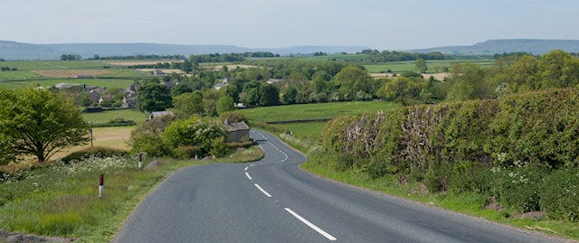 a road leading through the countryside