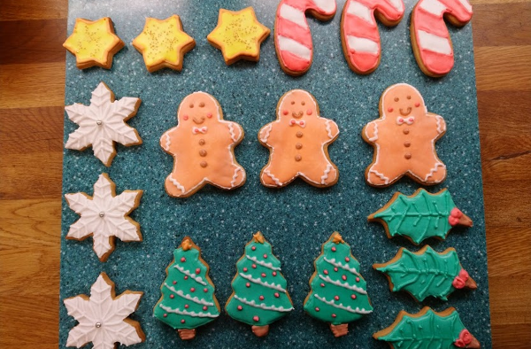 Biscuits baked, iced and neatly arranged in trios ready to eat!