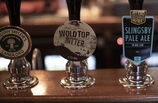 3 draught beer pumps along the bar