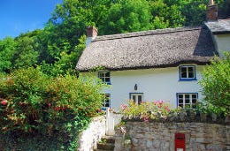 A traditional white washed stone cottage in Devon you'll love