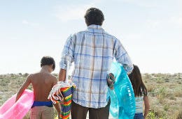 Family heading for the beach