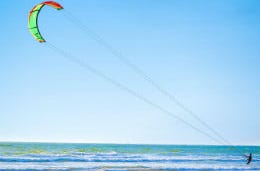 A man kite surfing on the North Devon coast
