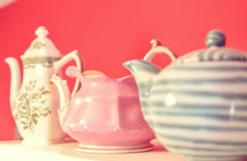 A row of collectible teapots