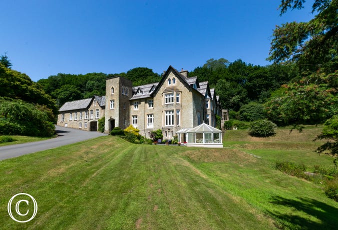 Sheplegh Court was constructed in the early 1800's and is set in 22 acres of beautiful tranquil grounds nestling in the folds of a lovely valley with extensive gardens, woods, parkland and views across glorious South Devon countryside.