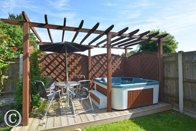 Another added extra that comes with this property is the use of the hot tub in the garden