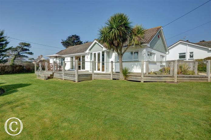 A beautiful bungalow set in mature gardens with a contemporary edge