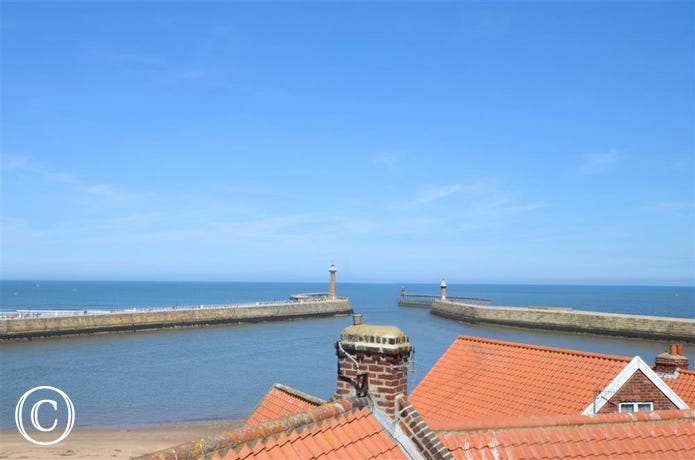 Fantastic views across the Harbour entrance and the Tate Hill sands from the top floor of the property.