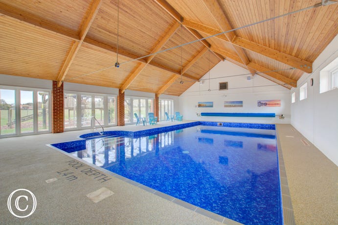 The property benefits from use of this delightful shared swimming pool