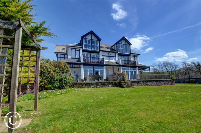 This comfortable apartment is situated on the second floor of an impressive detached property