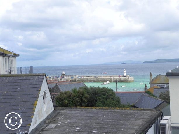 Views of St Ives Harbour over the rooftops