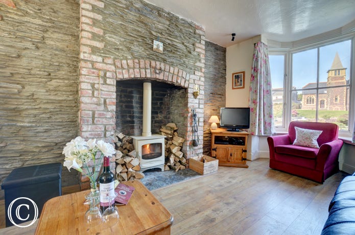 The woodburner makes the sitting room extremely cosy on cooler evenings
