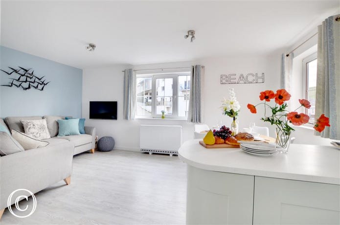This stylish  contemporary apartment has been designed to provide the perfect beach-base retreat for surfers and families