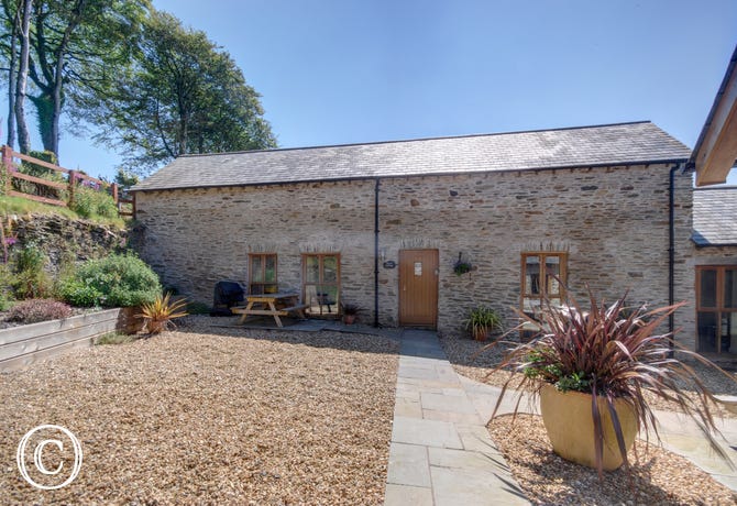 This fabulous barn conversion with eco credentials nestles in beautiful countryside