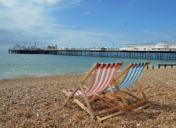 Grab a striped deck chair and enjoy the shingle beach at Brighton