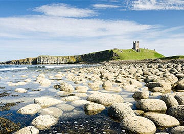 A ruin on the coast at low tide